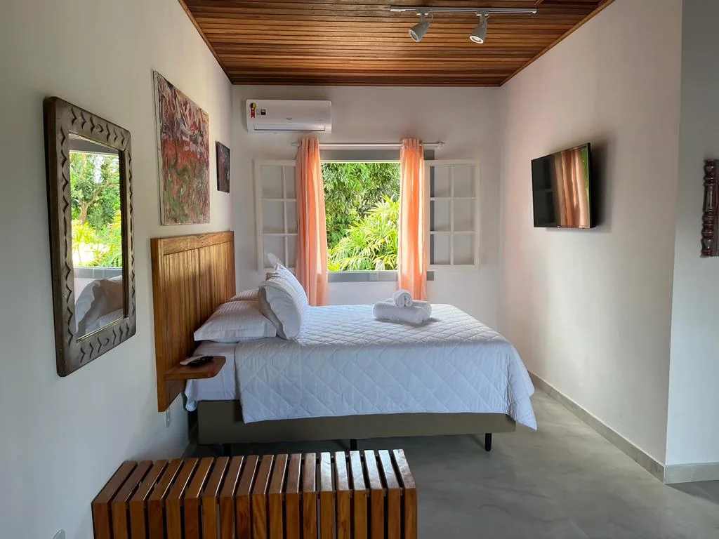 Suítes — Casa Arte Caborê